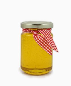 נר ג'ל בצבע דבש מגיע בצנצנת דבש