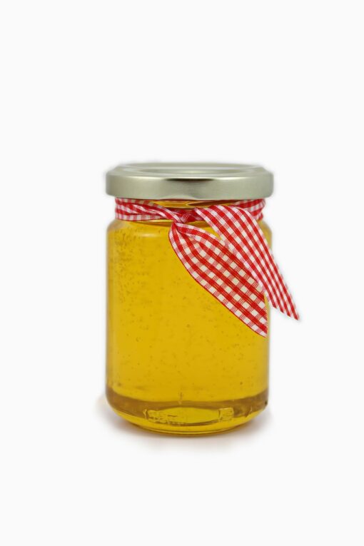 נר ג'ל בצבע דבש מגיע בצנצנת דבש